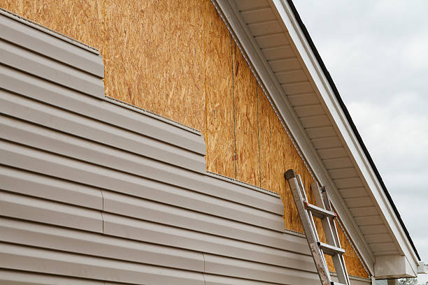 Professional Storm Damage Siding Repair technician working in Nova, OH